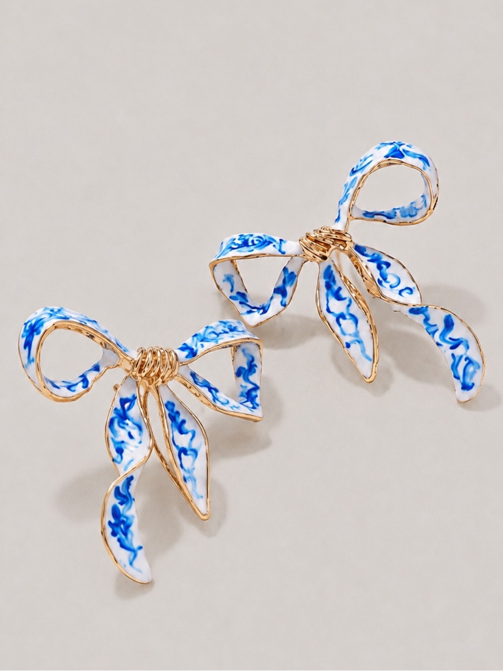 New! Blue Oil Drip Bow Earrings NWOT